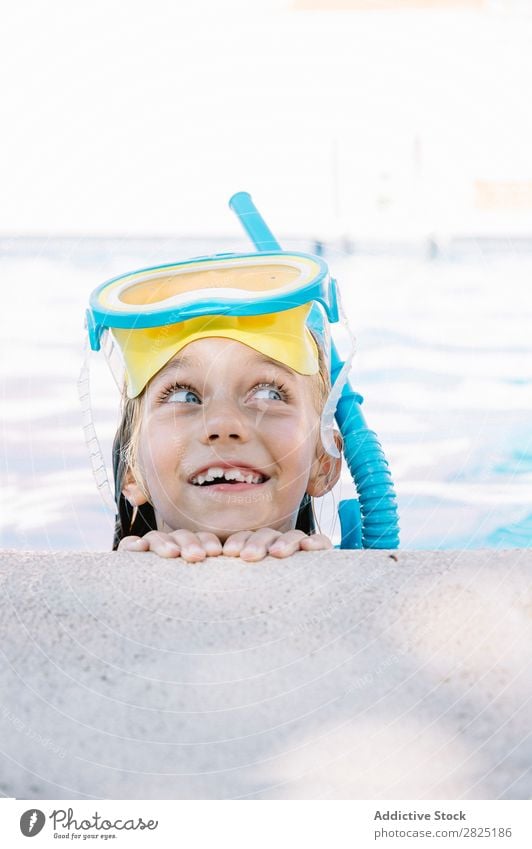 Kid in snorkel mask posing on poolside Child Swimming pool Mask Relaxation Vacation & Travel Posture human face Leisure and hobbies Dive Contentment Cheerful