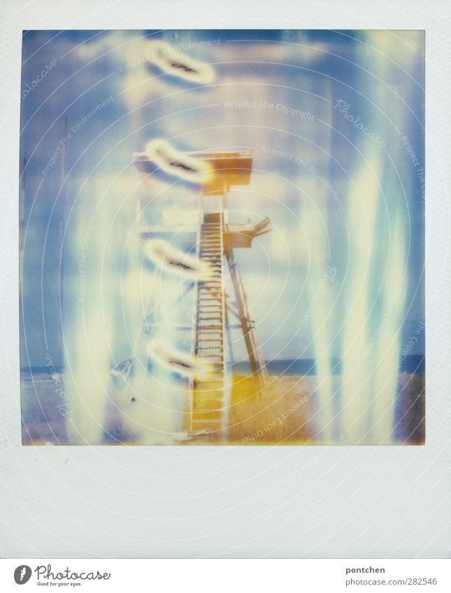 Polaroid from the surveillance tower on the beach. Light effects. Security Landscape Beach Old Tower Shaft of light Sky blue Colour photo Exterior shot