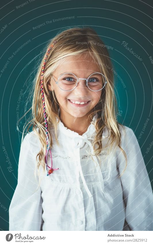 Cute schoolgirl posing in a classroom Girl Classroom Blackboard Person wearing glasses Cheerful Stand Education School Grade (school level) Student