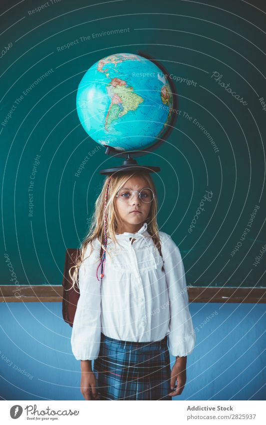 Pupil girl posing with globe Girl Classroom Globe Geography Cute Education School Grade (school level) Student Youth (Young adults) Study Child Lessons learn