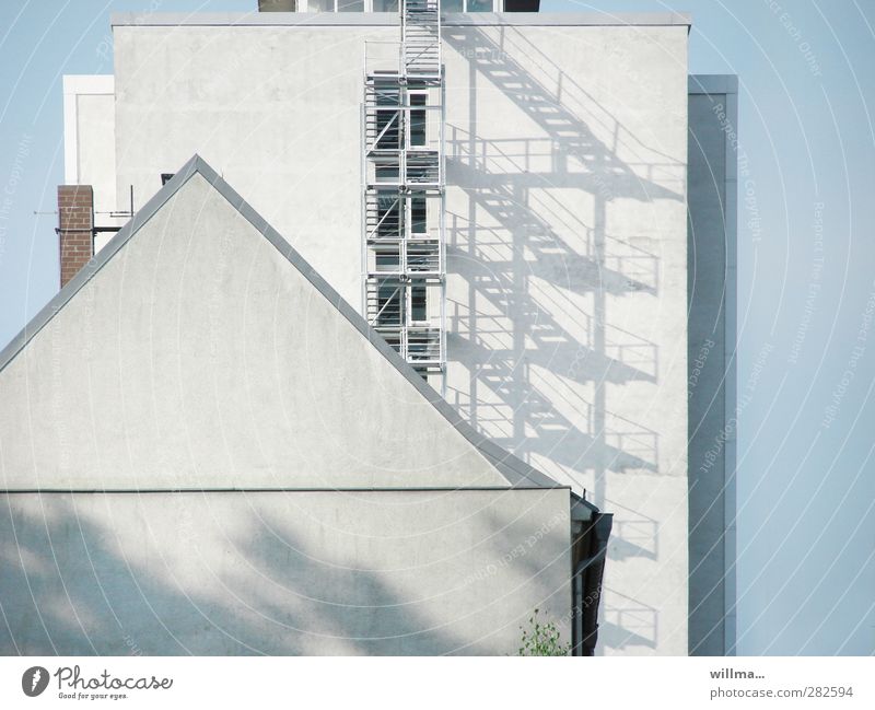 diversity houses High-rise Building Architecture Facade Window External Staircase Pointed roof Manmade structures Competition Difference Shadow Shadow play