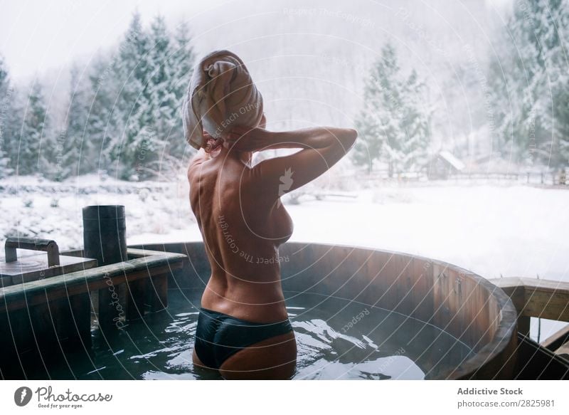 Naked woman standing in plunge tub Woman Swimming Nature Winter Water Healthy Beautiful Vacation & Travel Romania Float in the water topless Stand Snow Ice