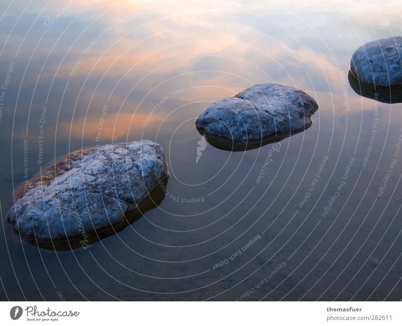 Zen Stone Water Blue Gold Orange Moody Serene Patient Calm Wisdom Contentment Idyll Reflection Sky Surface of water Clouds Sunset Esotericism Lakeside