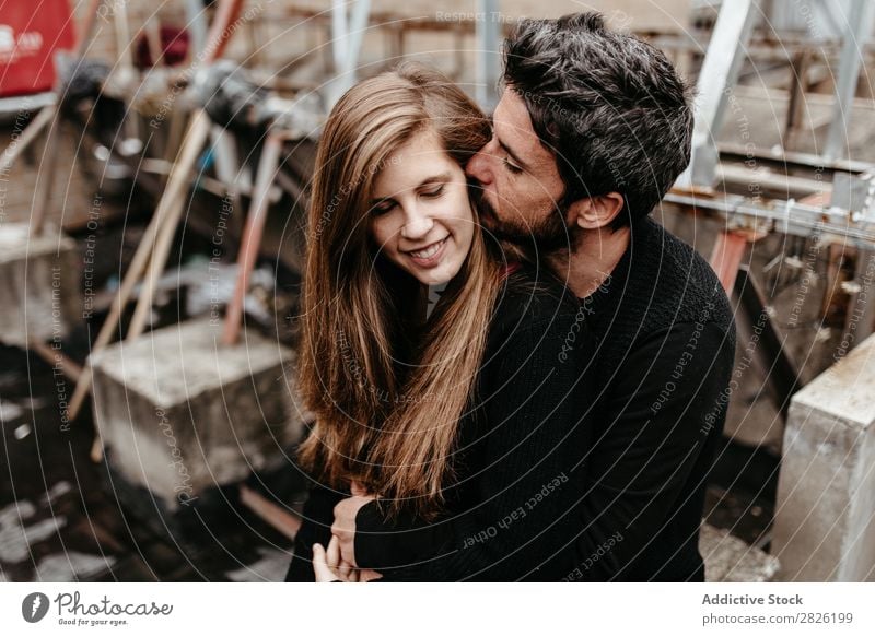 Man kissing girlfriend ear from behind Couple Kissing Embrace Love Together Roof Happy Relationship Beautiful Happiness Adults Youth (Young adults) Girl Romance