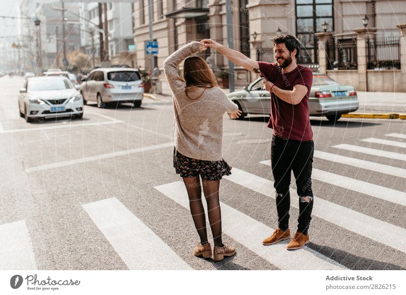 Happy couple dancing on crosswalk Couple Dance Street City Beautiful Together Smiling Lifestyle Man Girl Woman Town Pedestrian Pedestrian crossing