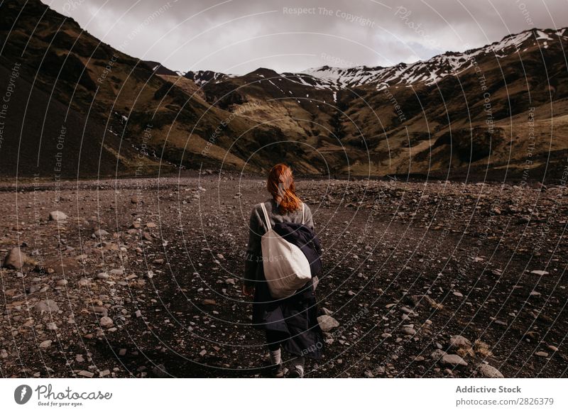 Woman posing on background of mountains Mountain Iceland Nature Vacation & Travel Landscape Tourism Lanes & trails Volcanic Adventure scenery North Backpack