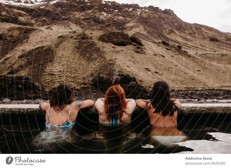 Three women in thermal spring Woman Iceland Relaxation Tourism Wellness Vacation & Travel Water Therapy Volcanic Resort Spa Healthy Hot Bathtub Natural