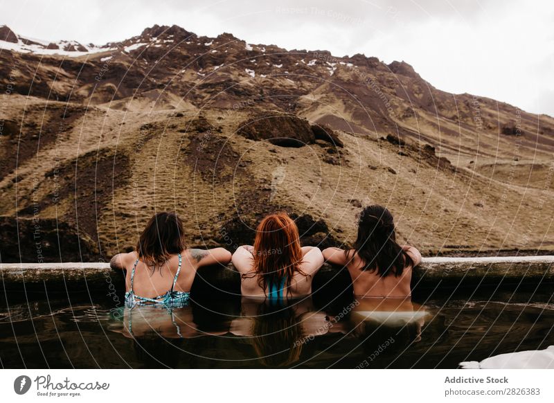 Three women in thermal spring Woman Iceland Relaxation Tourism Wellness Vacation & Travel Water Therapy Volcanic Resort Spa Healthy Hot Bathtub Natural