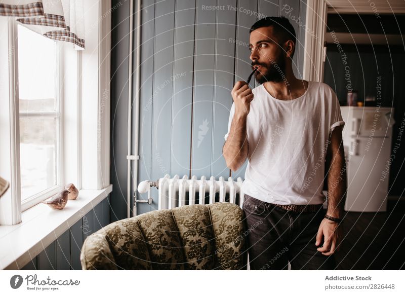 Man smoking pipe inside Pipe Hipster Style Adults House (Residential Structure) Iceland Tobacco Vintage Smoking bearded Posture Addiction Smoke Elegant