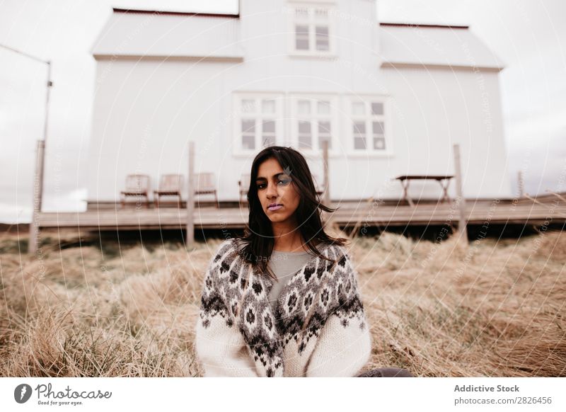 Woman posing on background of house House (Residential Structure) residential Iceland Nature Rural Terrace Home scenery Natural waving hair Landscape Plain Farm