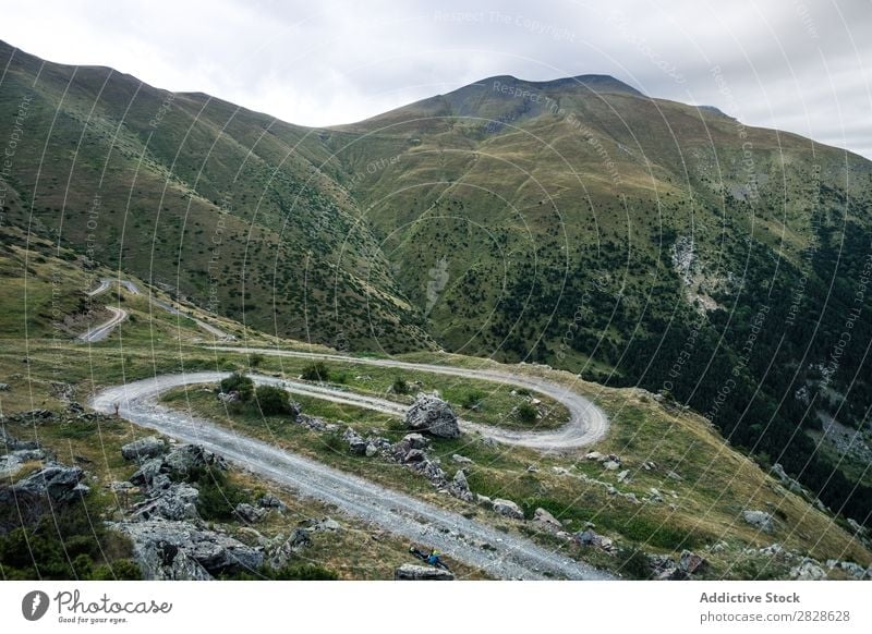 Curvy road in mountains Valley Mountain Street serpentine Landscape Panorama (Format) Mysterious Rural Vantage point Curved Tourism Vacation & Travel Nature