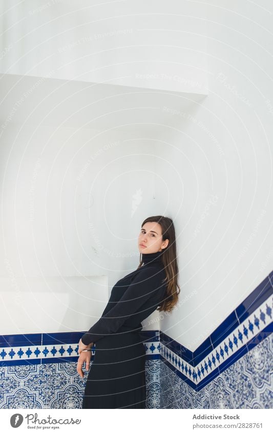Sensual woman standing at tiled wall Woman To enjoy pretty Youth (Young adults) Stand Tile Stairs Steps Beautiful Brunette Attractive Human being