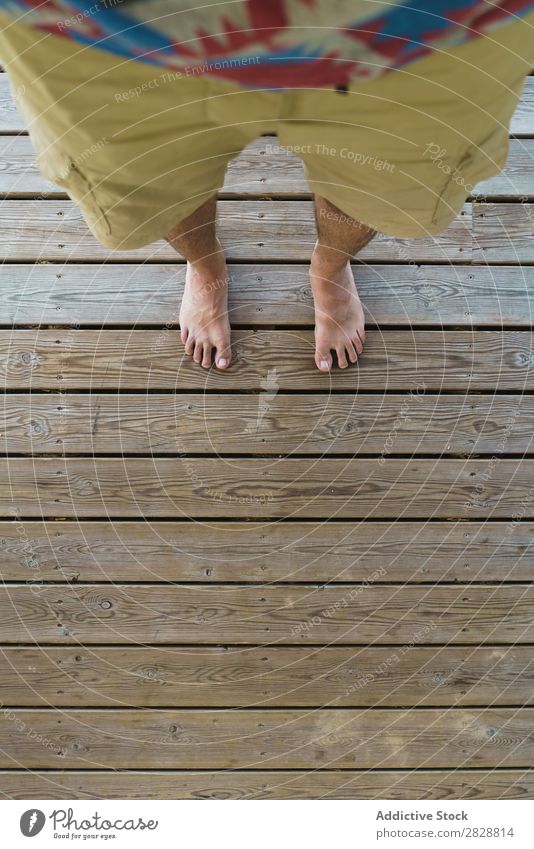 Male feet on wooden floor Man Feet Story Wood Stand Legs Barefoot beachwear Lifestyle Human being Plank Board Home Wear Rough Abstract Clothing conceptual