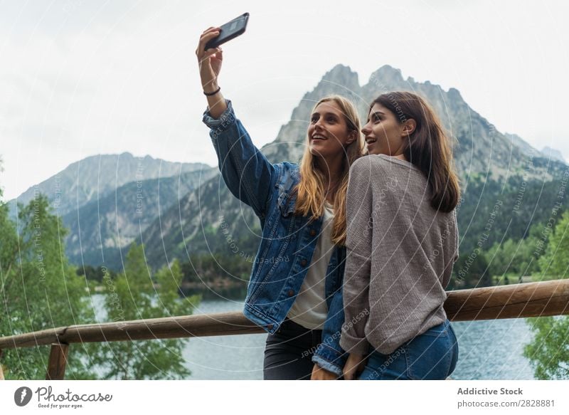 Women taking selfie on mountain road Woman Street Mountain Walking Hiking Vacation & Travel Adventure Tourist Youth (Young adults) Nature Trip