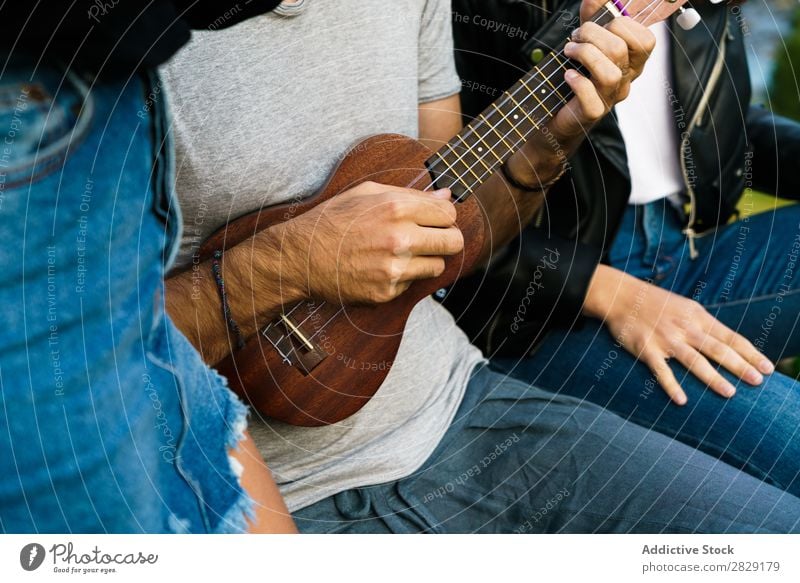 Crop friends singing in nature Woman Man Music Ukulele Beautiful Happy Youth (Young adults) Listening performing Joy Musician instrument Summer Guitar