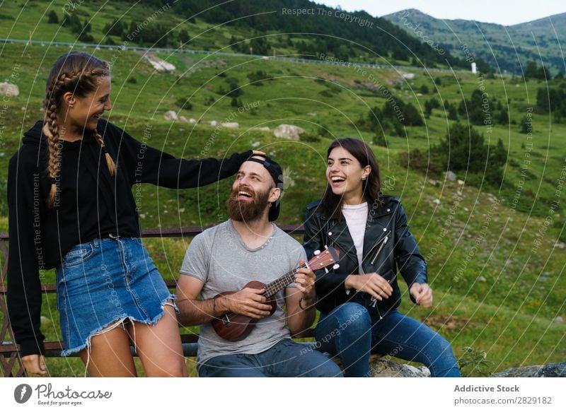 Friends singing in nature Woman Man Music Ukulele Beautiful Happy Youth (Young adults) Listening performing Joy Musician instrument Summer Guitar