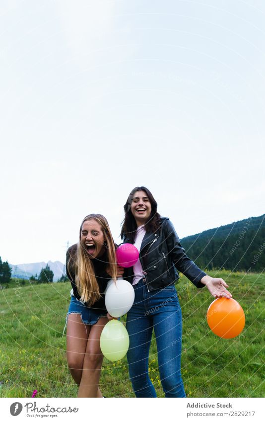 laughing women throwing up balloons Woman Nature Friendship Together Human being Hands up! pretty Posture Freedom Joy Beautiful Beauty Photography Happiness