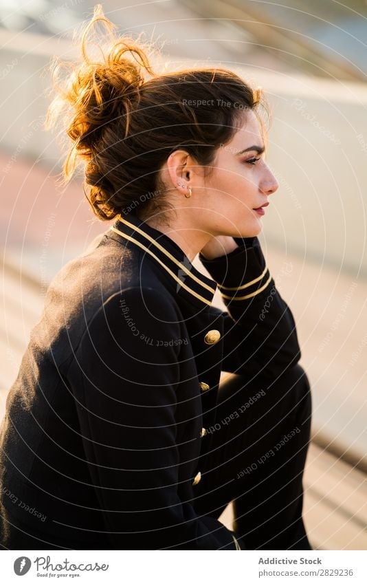 Woman in casual looking away woman stairs sitting clothes confident stylish serious young hair female beautiful girl attractive glamour lady gorgeous hairstyle