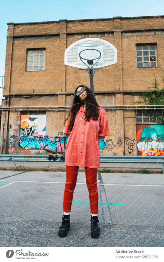 Woman standing at playground Style Street Fence Town Posture Portrait photograph Attractive Beauty Photography Hip & trendy Lifestyle pretty Fashion