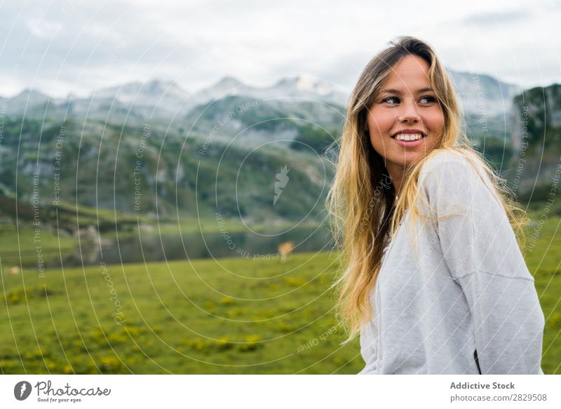 Woman posing in mountain meadow Meadow Relaxation Mountain Nature Field Girl Grass Beautiful Youth (Young adults) Green Spring Human being Happiness Freedom