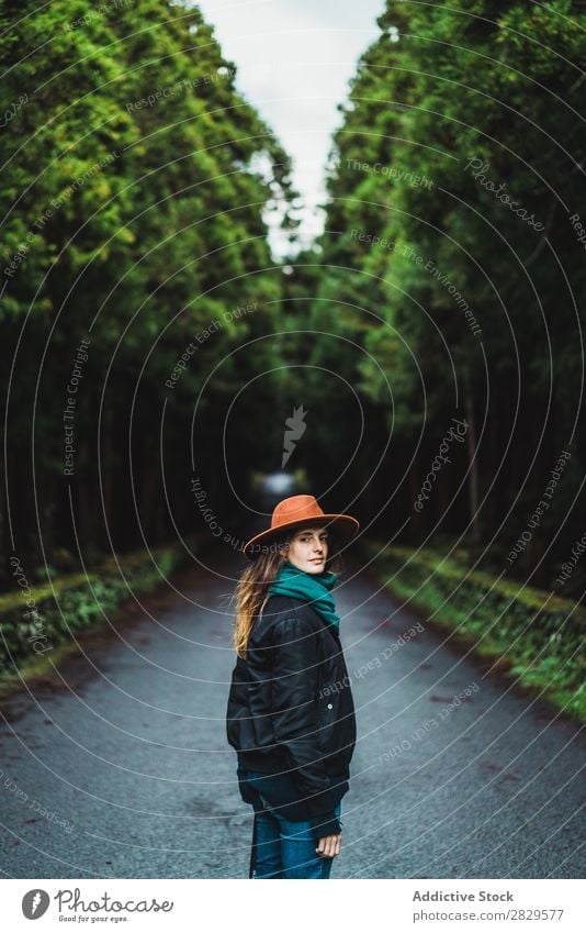 Woman with camera in woods Photographer Forest Green Nature Camera Hat pretty Youth (Young adults) Street Asphalt Smiling Environment Looking into the camera