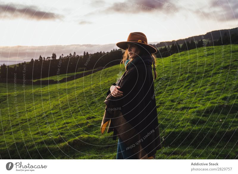 Woman in green cold fields Grassland Freedom Field Peaceful Nature Rural Wilderness scenery Stand Green Landscape Fog Dream Pasture Tourism tranquil Valley Cold