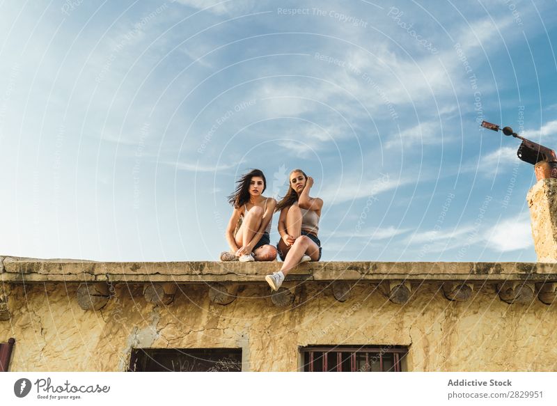 Pretty women sitting on roof Woman Roof Sit pretty Youth (Young adults) Beautiful Human being Vacation & Travel Lifestyle Sky Leisure and hobbies Relaxation
