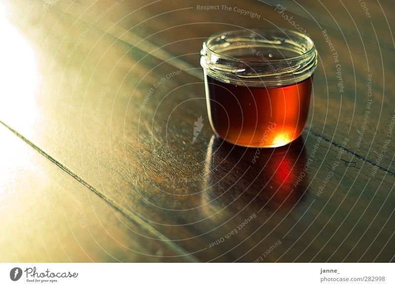 honey Food Candy Interior design Table Warmth Brown Orange Glass Honey Colour photo Light Reflection