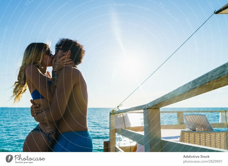 Embracing loving couple on beach Couple Beach embracing Love Resort Honeymoon Exotic Tropical Together enjoyment Paradise 2 Body Relationship romantic
