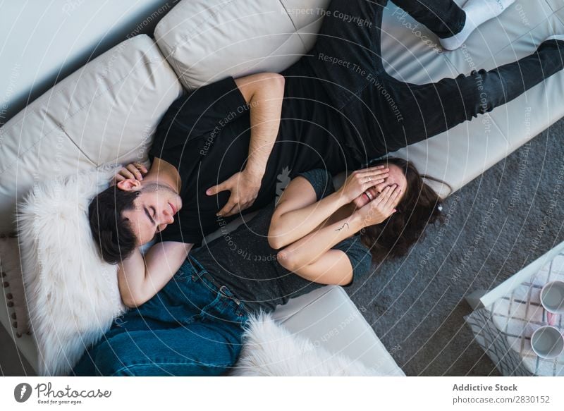 Couple lying on sofa Home Together Lie (Untruth) Sofa Couch Cozy Human being Happy Love House (Residential Structure) Man Woman Lifestyle 2 Youth (Young adults)