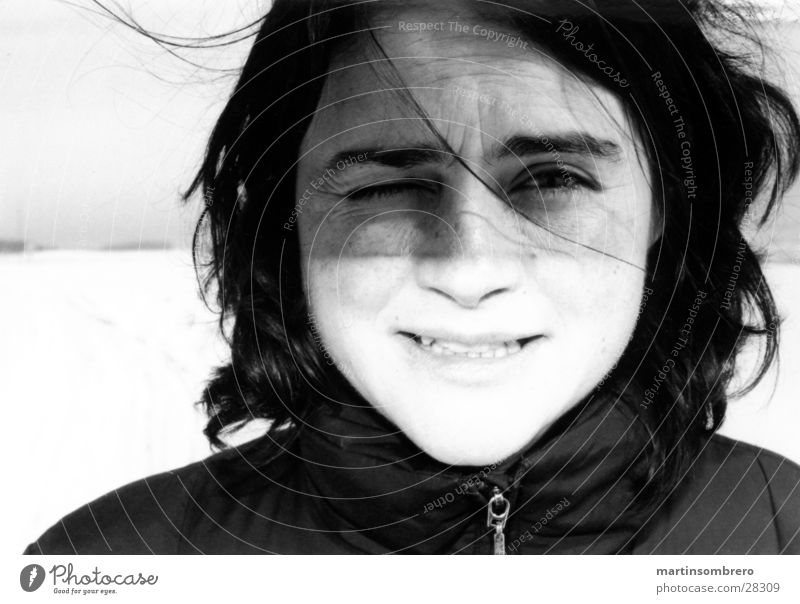 dazzled Woman Black & white photo wild hair strong light Laughter Snow blink