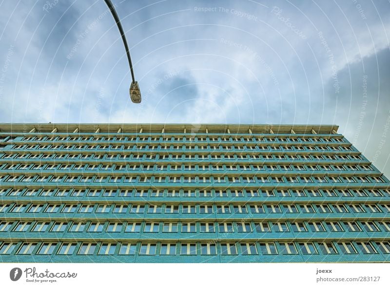 One against all High-rise Facade Window Blue Green Town Street lighting Colour photo Exterior shot Pattern Deserted Copy Space right Copy Space top Day
