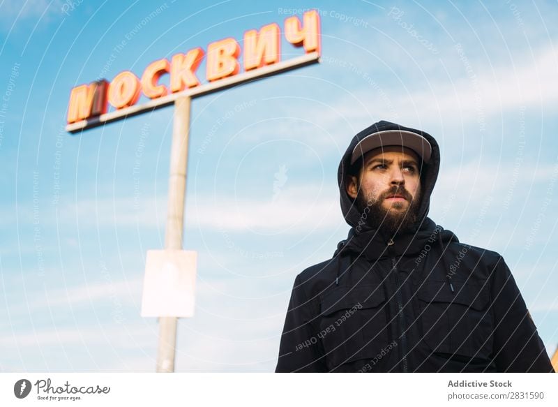 Man standing at post on street handsome City Sign Mail Looking away Street Youth (Young adults) Town Lifestyle Easygoing Fashion Style Adults Modern Human being