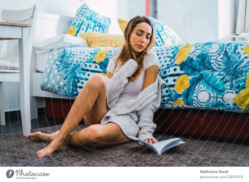 Pretty woman reading book on floor Woman pretty Home Youth (Young adults) Posture Sit Reading Bed Book Novel Literature Portrait photograph Beautiful Lifestyle