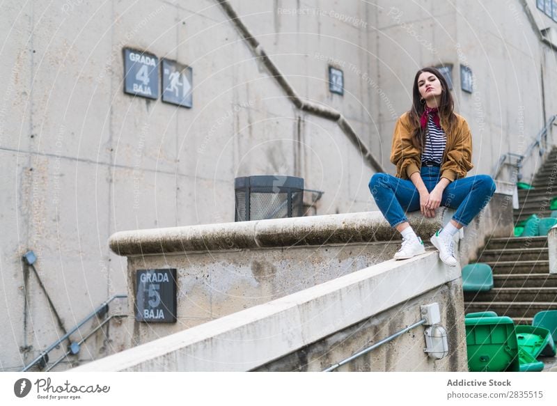 Young cute girl in an abandoned stadium Youth (Young adults) attitude Cute Beautiful Girl Stadium Auditorium Cold Winter Airplane seat Portrait photograph