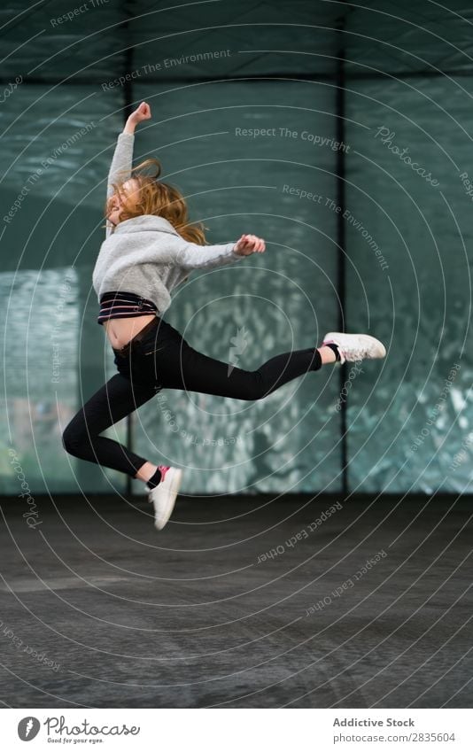 Cheerful jumping woman Woman Running Jump Joy pretty Happy Easygoing Guest Smiling Happiness Youth (Young adults) Beautiful Sweater Girl Beauty Photography