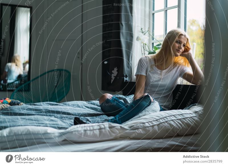 Woman on bed looking at window pretty Home Youth (Young adults) Blonde Sit Bed Window Dream Pensive Beautiful Lifestyle Beauty Photography Attractive