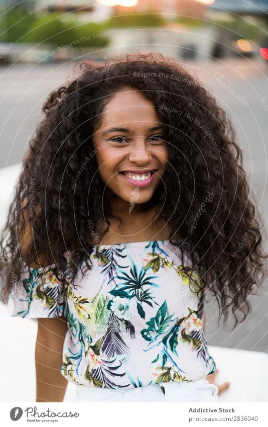 Young black woman smiling and looking at camera Woman pretty Youth (Young adults) Portrait photograph Looking into the camera Black African Head Beautiful Curly