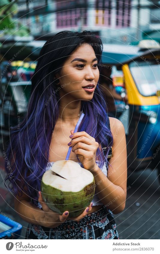 Asian woman with coconut Woman pretty Street Youth (Young adults) Beautiful Portrait photograph Coconut Drinking Straw Hair Purple asian eastern Fashion