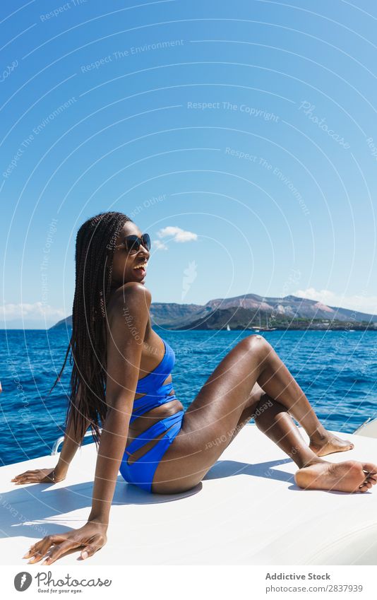 Stylish girl posing on yacht Woman Yacht Posture Summer Vacation & Travel Model Laughter Beautiful Self-confident Contentment Cruise Ocean Cheerful Feminine