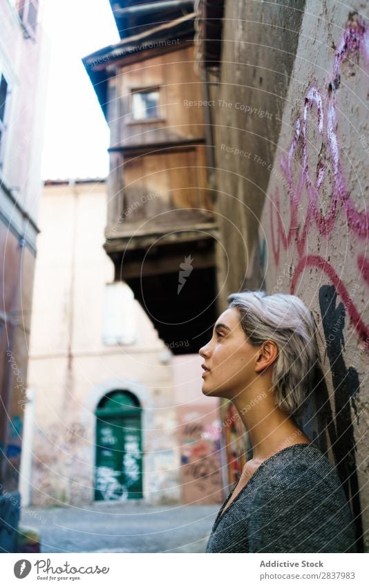 Smiling woman in alley Woman Alley Graffiti Wall (building) pretty Street Lifestyle Cheerful Calm Relaxation Blonde Walking Lovely Attractive Lady City