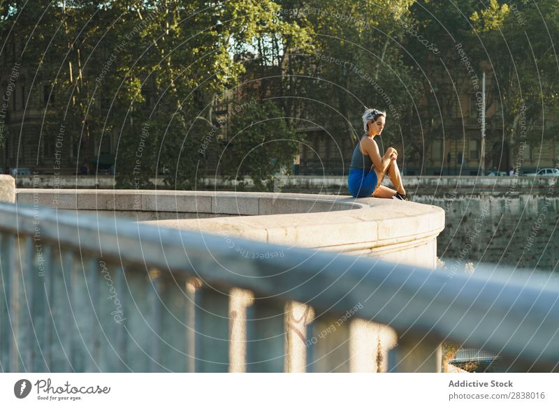 Stylish woman on fence of bridge Woman Posture Bridge Summer Town Style Youth (Young adults) romantic Vacation & Travel Relaxation Downtown Beauty Photography