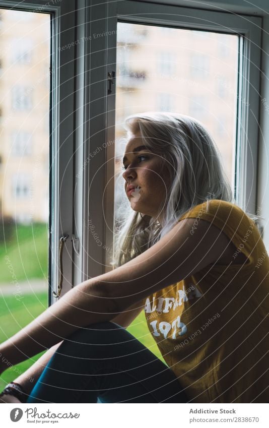 Thoughtful blonde woman at window Woman pretty Home Youth (Young adults) Blonde Window Sit Considerate Resting Beautiful Lifestyle Beauty Photography Attractive