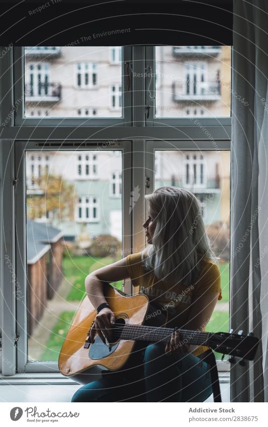 Musician sitting at window Woman pretty Home Youth (Young adults) Guitar Inspiration Playing Blonde Beautiful Lifestyle Beauty Photography Attractive