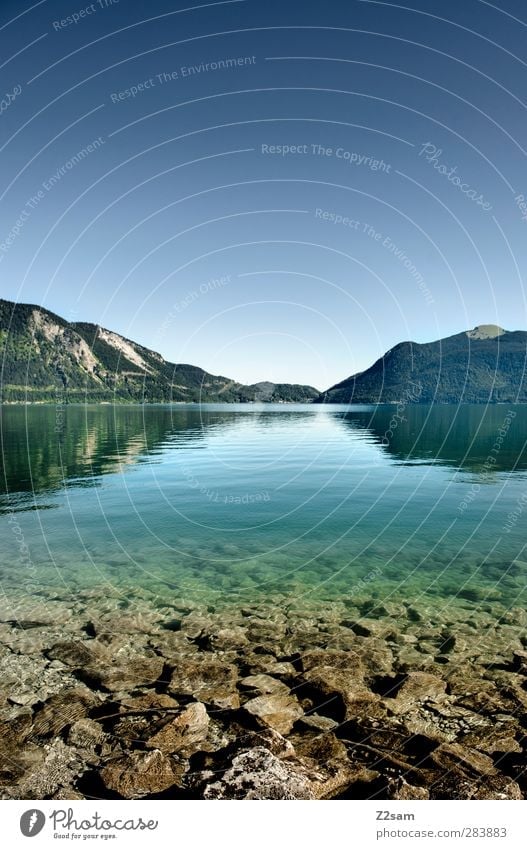 Walchensee Environment Nature Landscape Water Cloudless sky Summer Beautiful weather Rock Mountain Lake Far-off places Cold Sustainability Natural Clean
