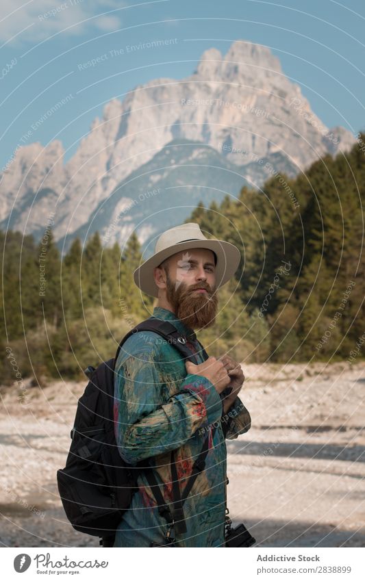 Handsome tourist in mountains Man Mountain Forest Autumn Backpack bearded handsome Hat Tourist Vacation & Travel Human being Landscape Nature Beautiful Colour