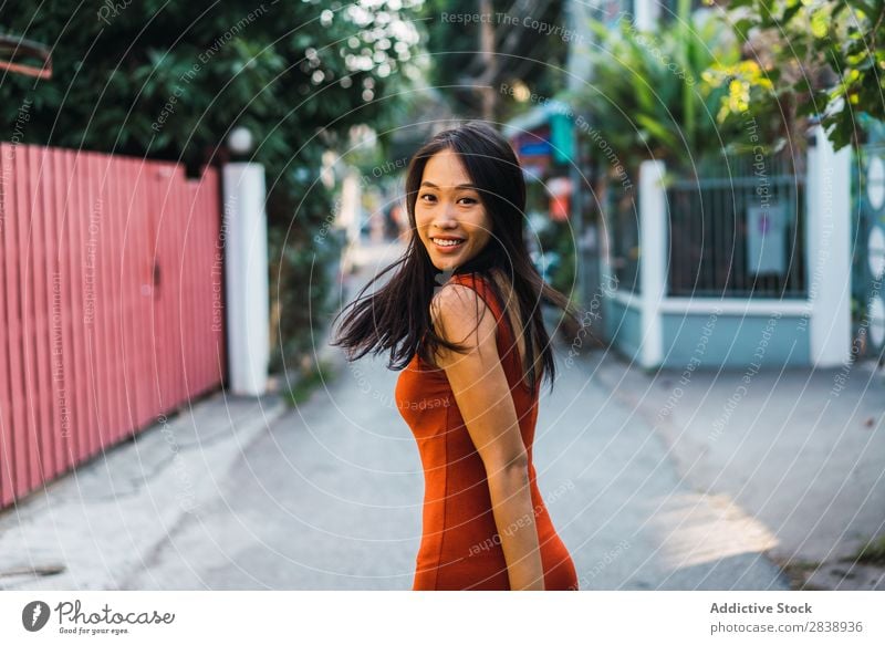 Cheerful woman posing on street Woman pretty asian Youth (Young adults) Happy Joy Street Green Town Beautiful Portrait photograph Attractive Beauty Photography