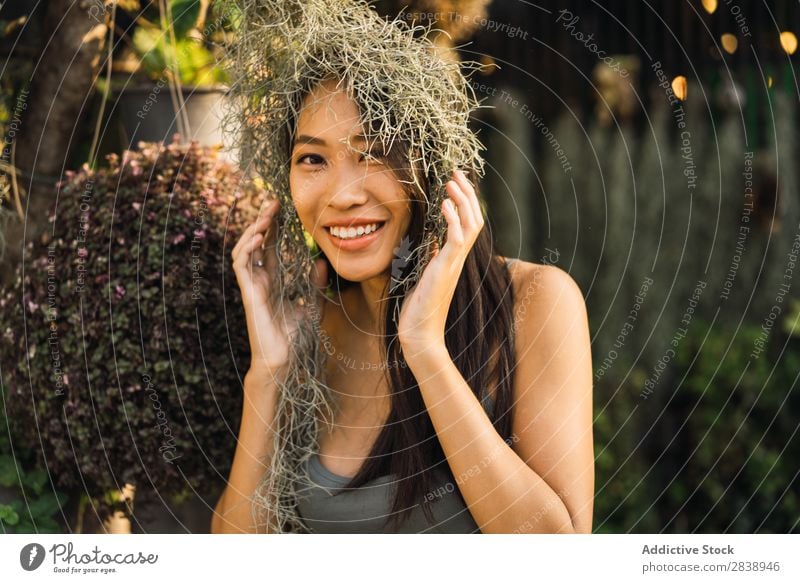 Cheerful woman with dry grass Woman pretty asian Youth (Young adults) Grass Dry Hair Posture Smiling Beautiful Portrait photograph Attractive Beauty Photography