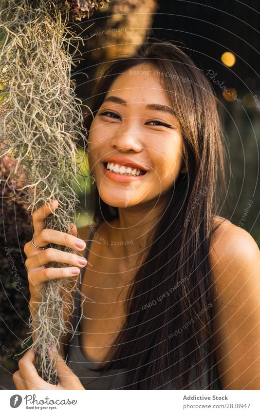 Cheerful woman with dry grass Woman pretty asian Youth (Young adults) Grass Dry Hair Posture Smiling Beautiful Portrait photograph Attractive Beauty Photography