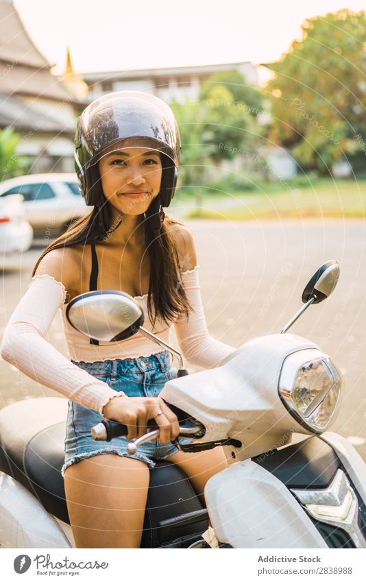 Young woman sitting on white scooter Woman pretty asian Youth (Young adults) Scooter Helmet Smiling Vacation & Travel Tourism Trip White Protection Beautiful